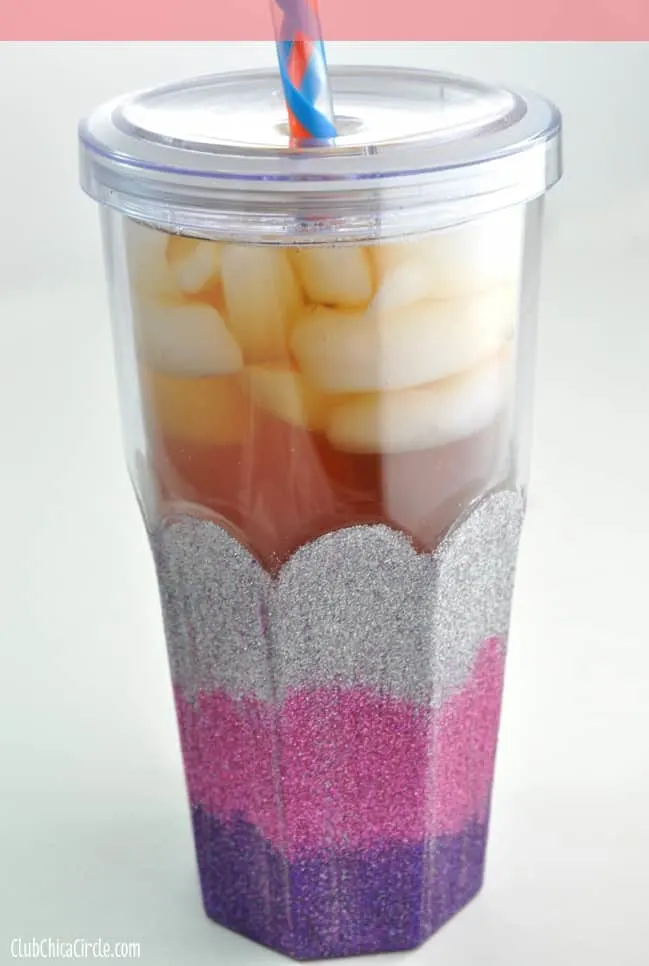 ombre glitter tumbler with ice tea inside