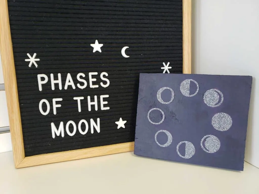 letter board with phases of the moon