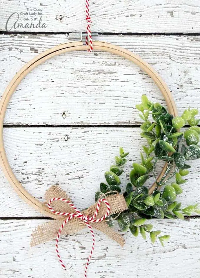 embroidery hoop wreath with greenery and bow