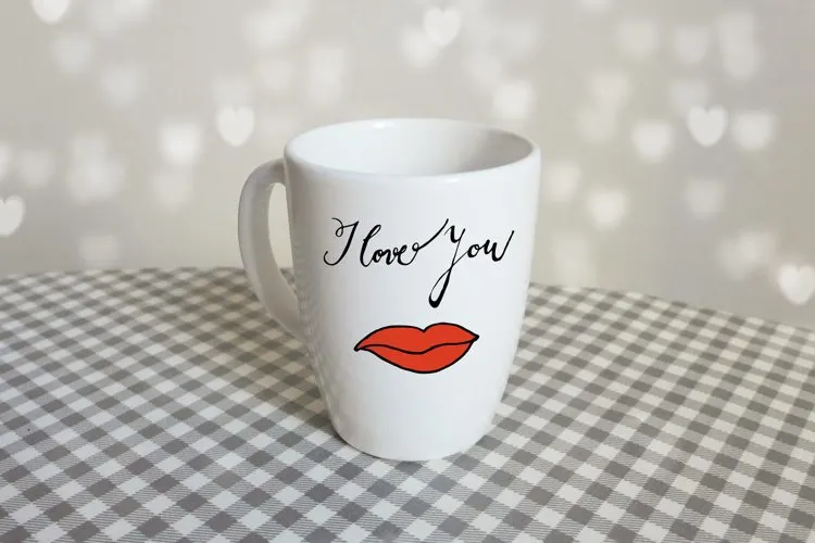 coffee mug with kiss and i love you quote