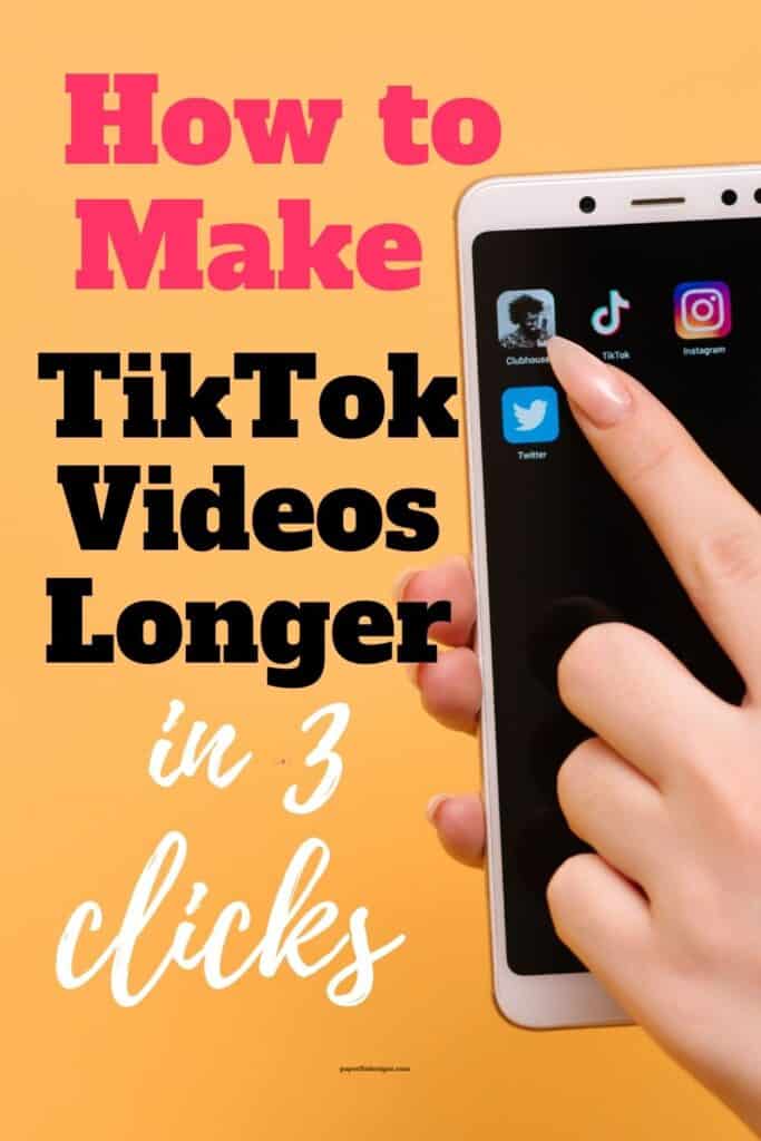Woman's hand holding a smartphone with social media apps on the screen.