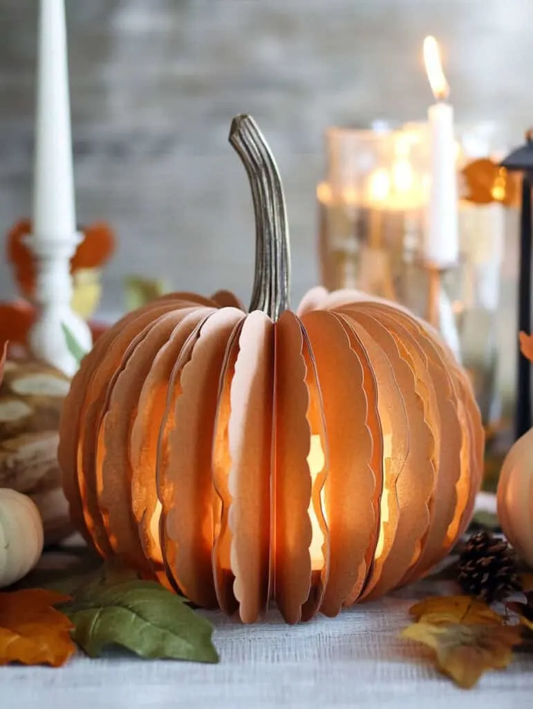 Bring warmth to your table with this glowing pumpkin lantern, an easy DIY Thanksgiving crafts idea that doubles as small fall crafts for adults. Perfect for November ideas for seniors, this project adds handmade charm to your autumn decor.