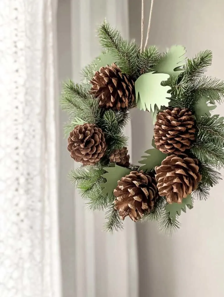 Make a statement with this hanging pinecone wreath, a seasonal favorite among harvest craft ideas. It’s a relaxing fall DIY crafts for adults project and a perfect option for autumn crafts for seniors who enjoy natural, handmade decor.