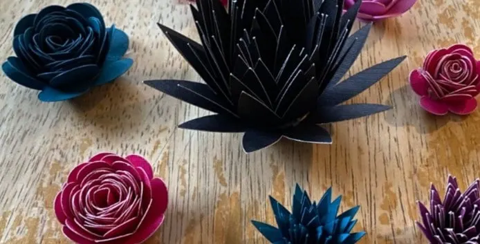desert flowers made out of card stock placed on a desk