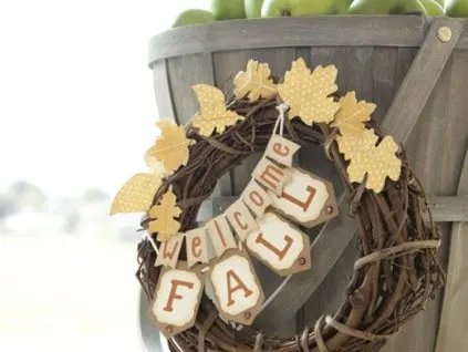 welcome fall banner on a twig wreath