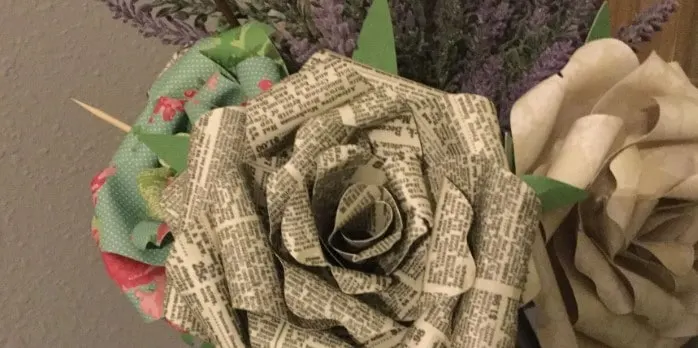 rose made out of newspaper