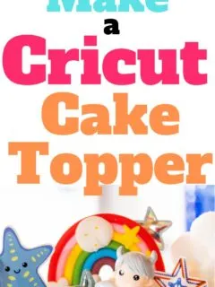 Cake topped with decorations including stars, a fairy, a rainbow and the text How to Make a Cricut Cake Topper