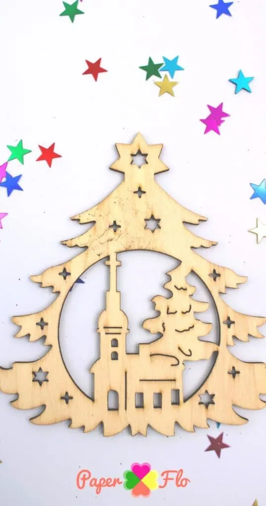 wooden ornament in the shape of a christmas tree