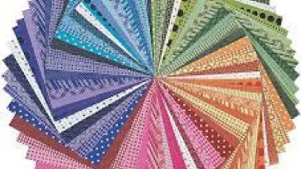 rainbow scrapbooking paper in a spiral