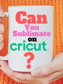 A woman's hand holding a coffee mug with the words Can you sublimate on Cricut?