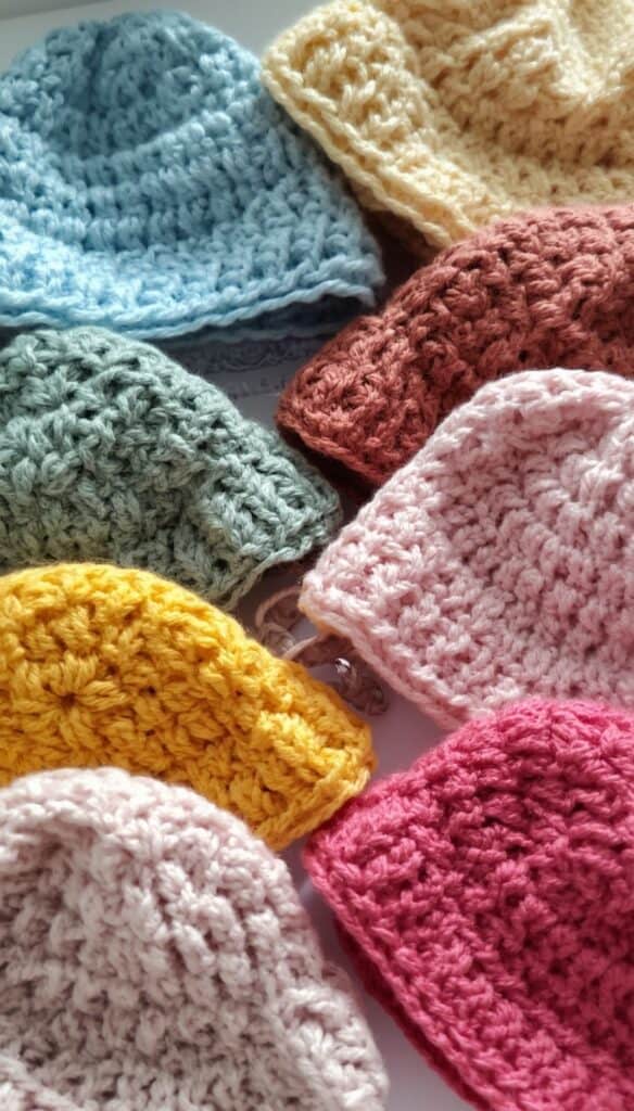 Crochet baby hats remain one of the top-selling crochet items year after year. New parents, baby shower guests, and grandparents are always searching for adorable handmade gifts. These baby hats are quick to crochet, easy to customize, and perfect for seasonal themes. If you want to build a profitable crochet business, baby items are a smart place to begin.